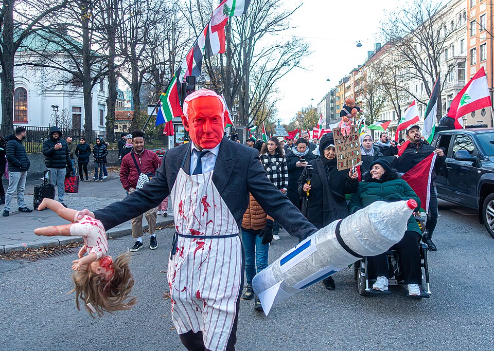 Demonstration in support of Palestine in Sweden with butcher imagery