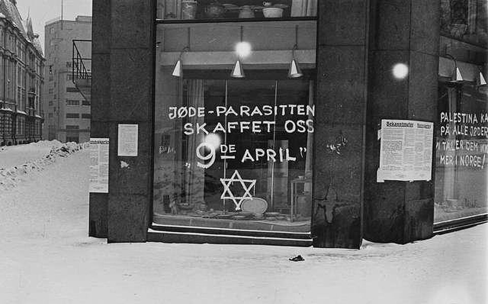 Nazi-era antisemitic vandalism reading Jew parasites